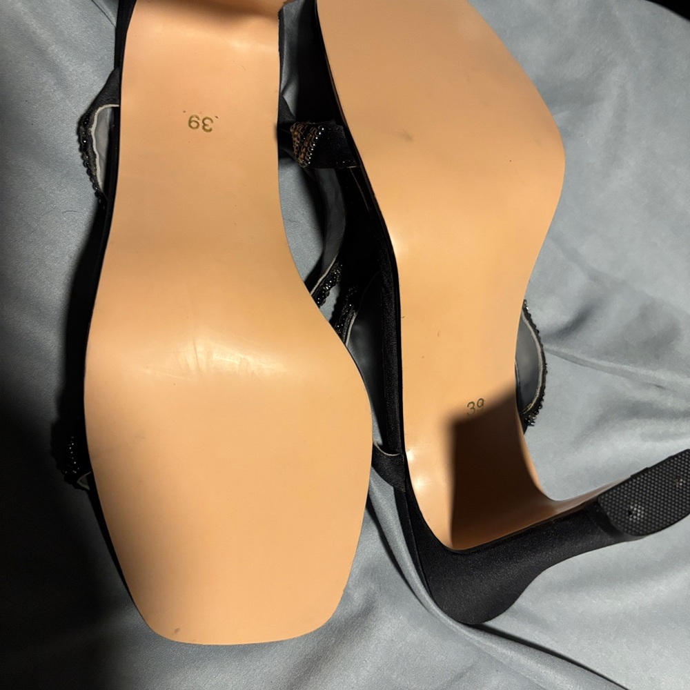 Brand new slip on heels.
